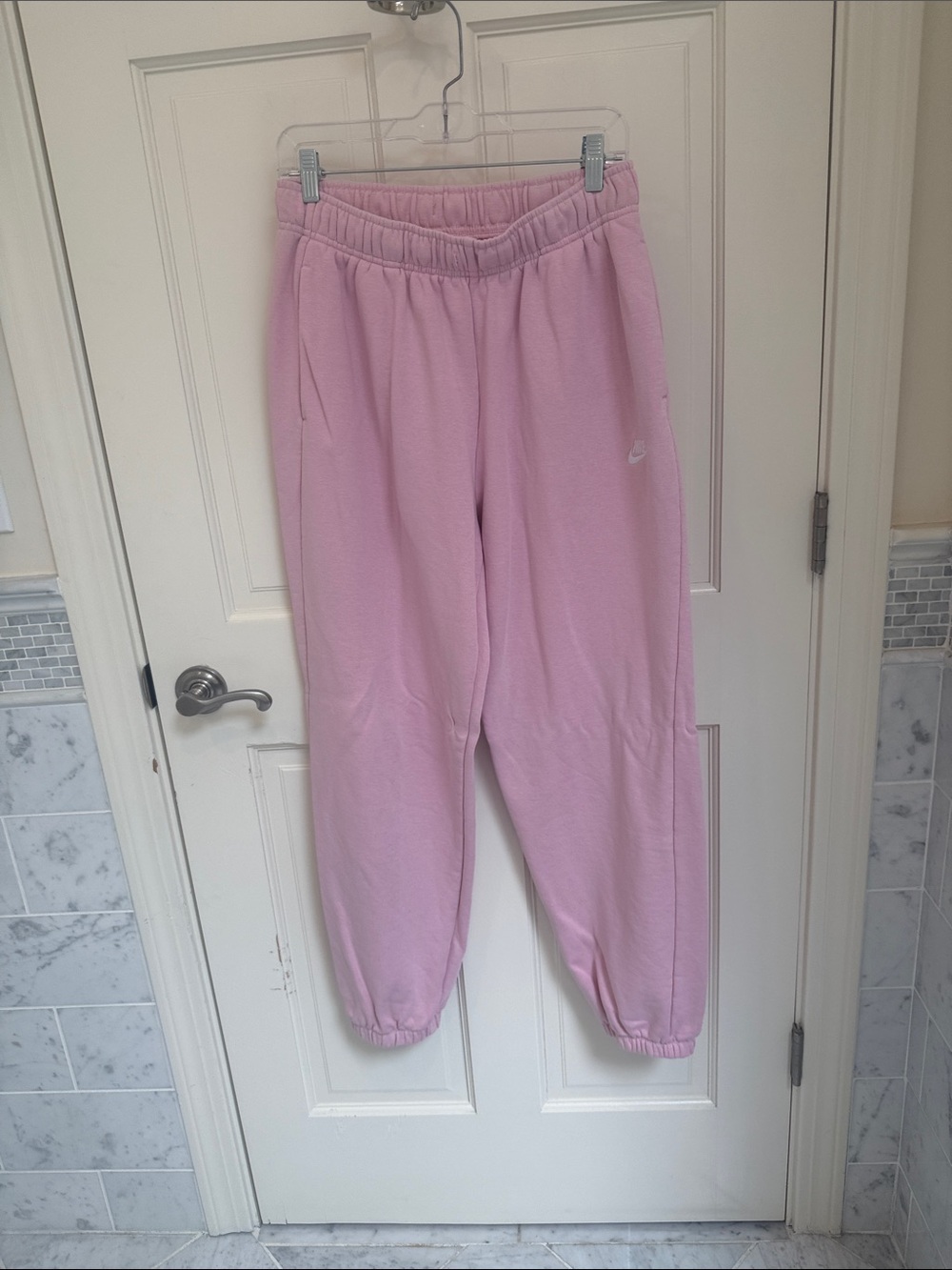 Nike Woman’s Light Pink Fleece Joggers with Elastic Ankles